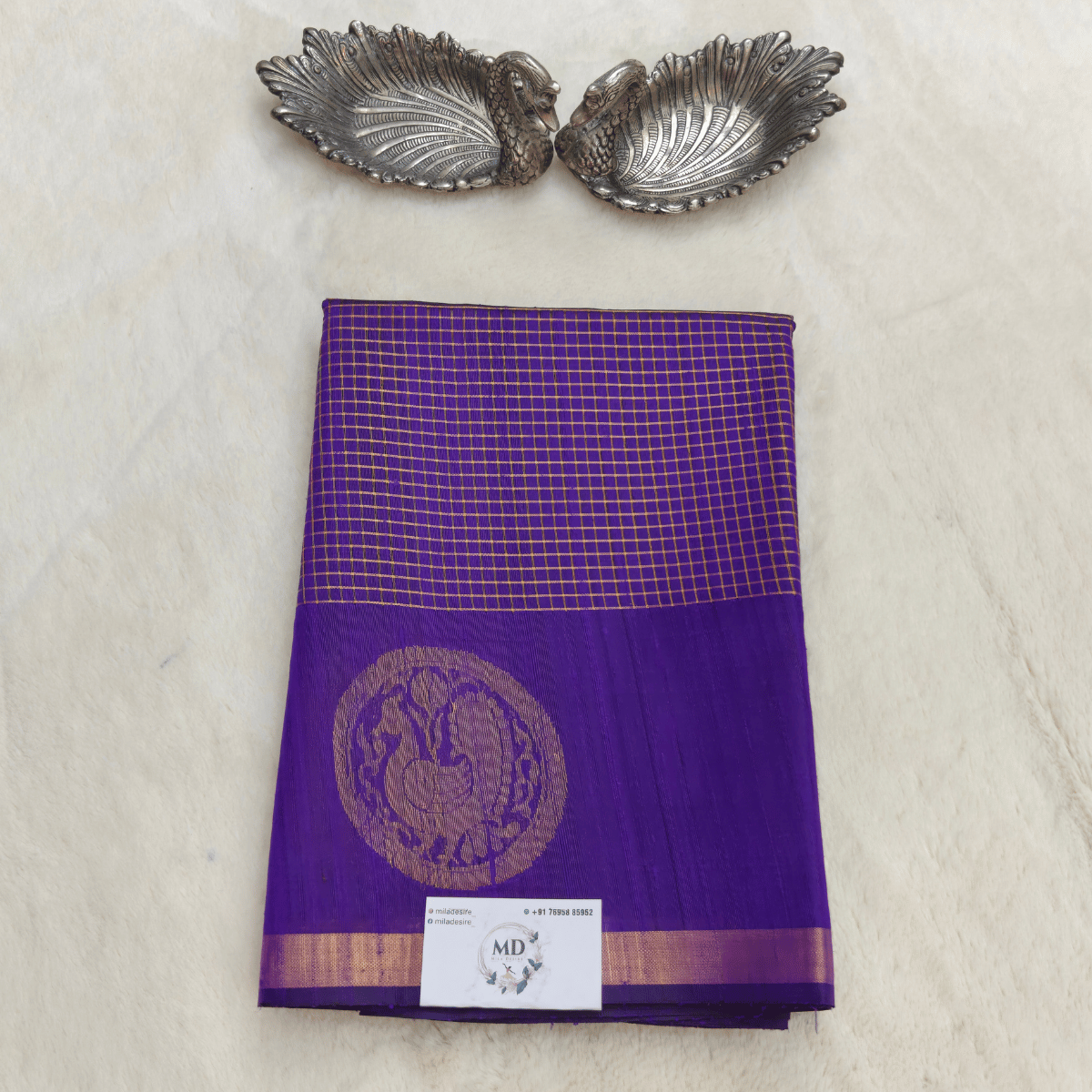 Pure dupion silk sarees with all-over treditional checks and motifs